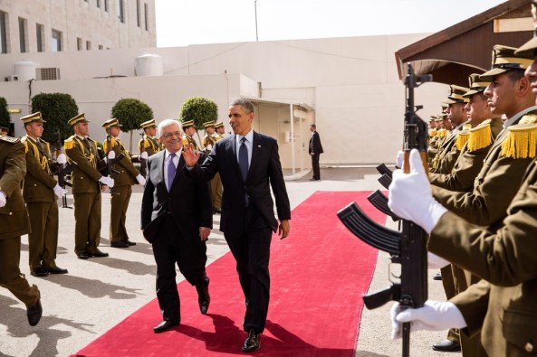 Preisident Obama protected by automatic assult rifels duribg his vistit to Ramallah, presenting a terror group as a "peace partner". 